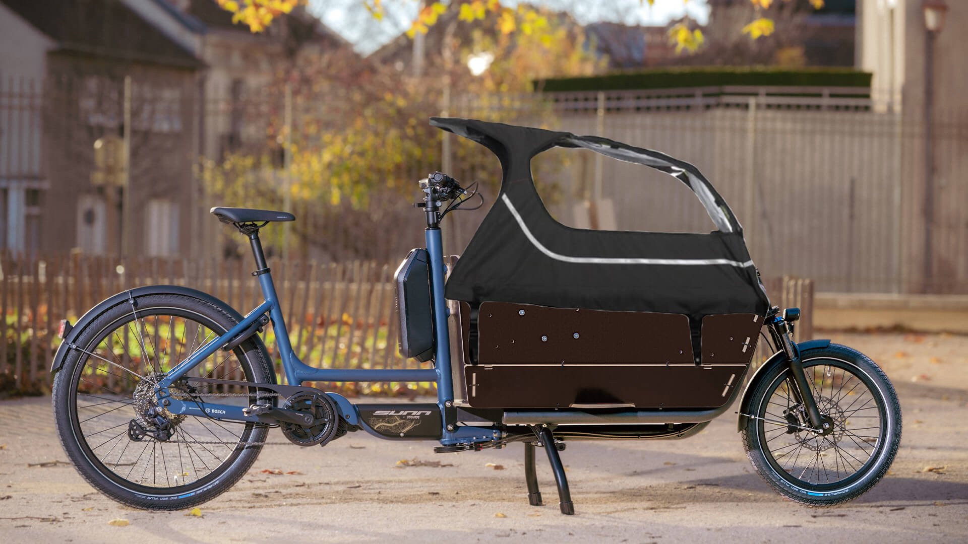 Équipez votre biporteur d'une canopy pour protéger vos enfants de la pluie !