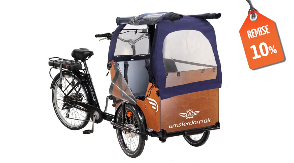 Remise de 10% sur ce triporteur équipé d'une protection pluie et de coussins pour les bancs