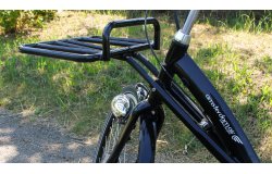 Le porte-bagage avant ne tourne pas avec la roue 