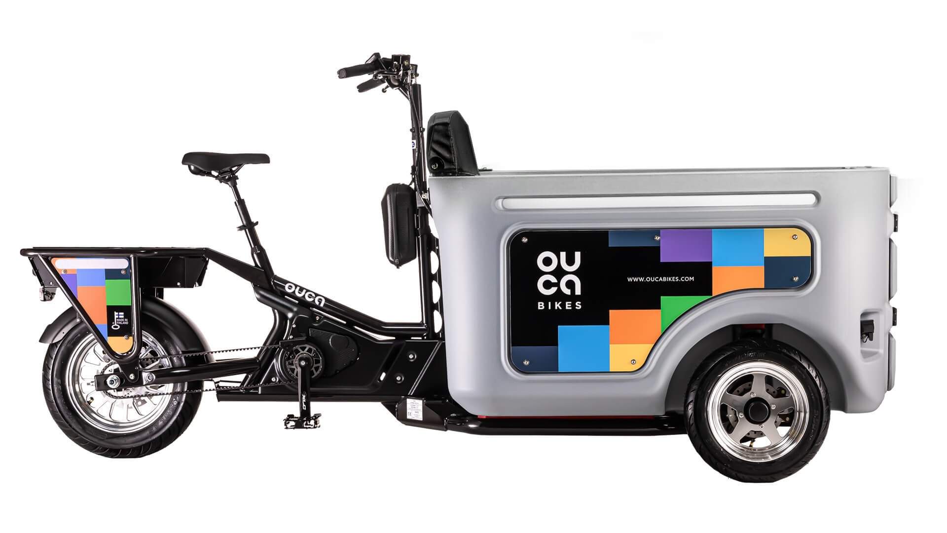 Le triporteur Ouca Taxi avec coffre gris clair