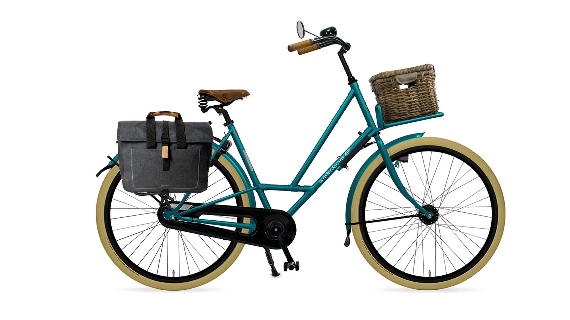 City Zen avec cadre bleu pétrole, porte-bagage avant avec malle et sacoche sur le porte-bagage arrière