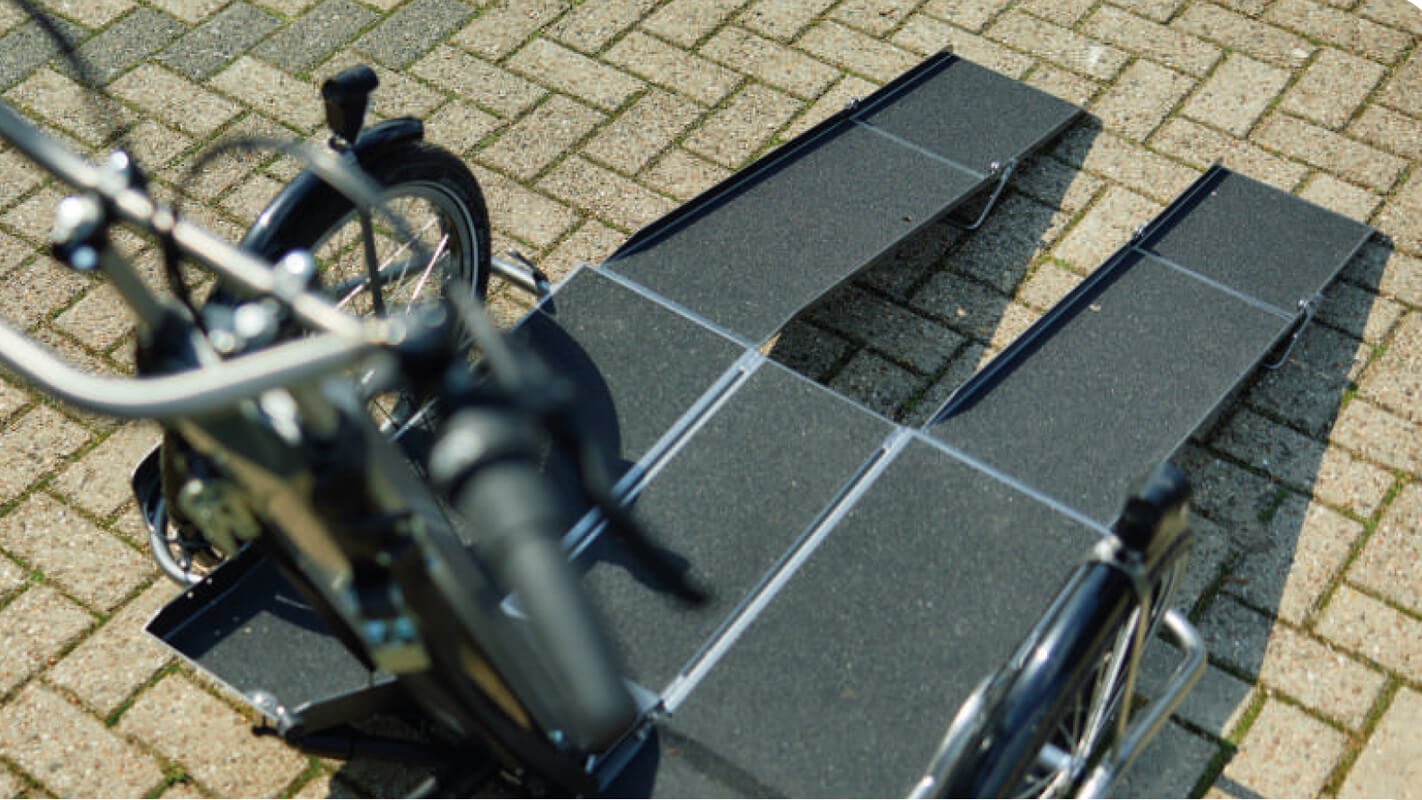 La plateforme avant du triporteur fauteuil roulant de Nijland